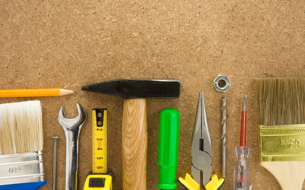 Tools on wood texture — Stock Photo, Image