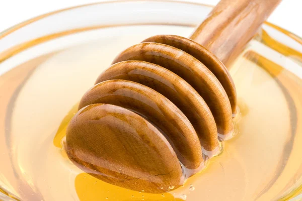 Honey and stick isolated on white — Stock Photo, Image