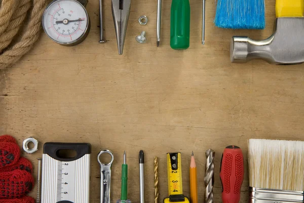 Uppsättning verktyg och instrument på trä textur — Stockfoto