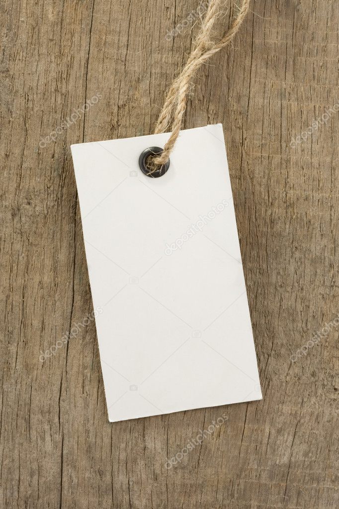 Price tag over wood background