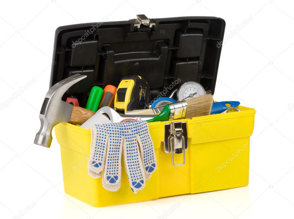 Set of tools on toolbox isolated at white