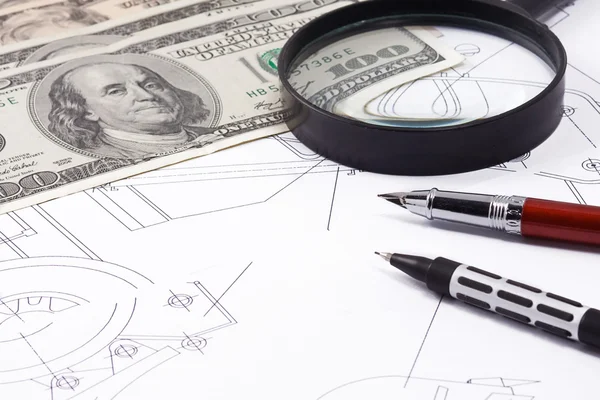 Magnifier and dollars on drafting — Stock Photo, Image