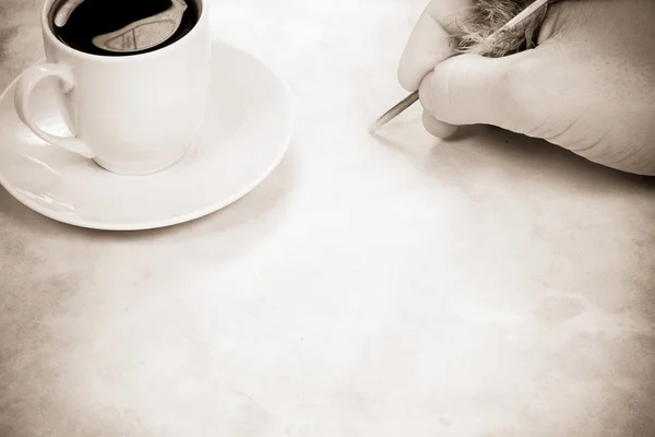 Café y escritura a mano — Foto de Stock