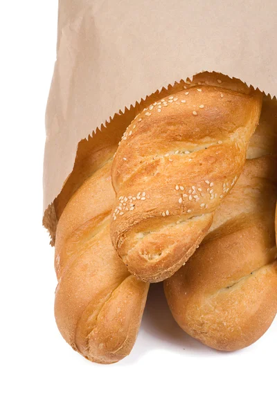 Bread in paper packet — Stock Photo, Image