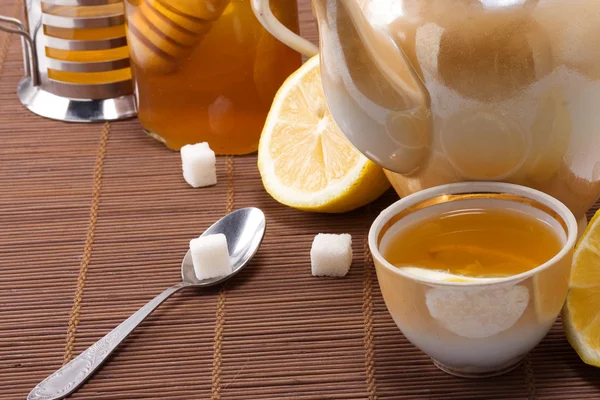 Tea, pot and honey — Stock Photo, Image