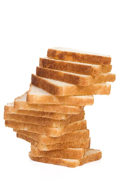 Na białym tle krojonego chleba na biały — Zdjęcie stockowe