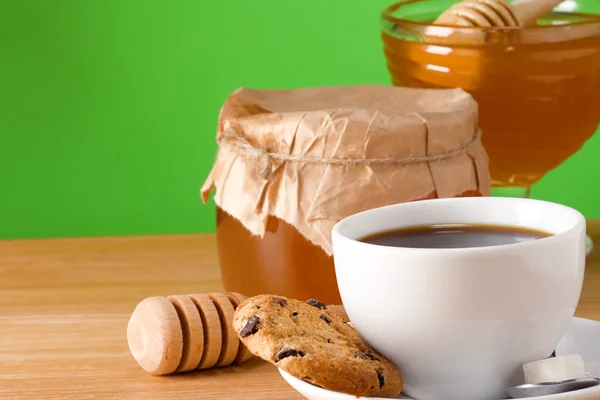 Kahvi, hunaja ja keksit — kuvapankkivalokuva