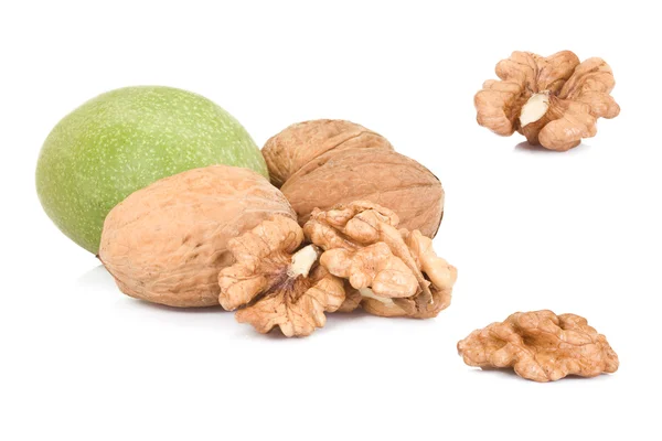 Whole and hulled walnuts — Stock Photo, Image