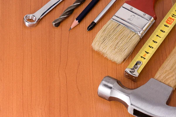 Tools on wood floor — Stock Photo, Image