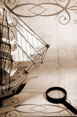 Ship and reading glass clipart