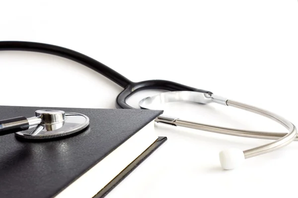 Stetoskop i czarna księga — Zdjęcie stockowe