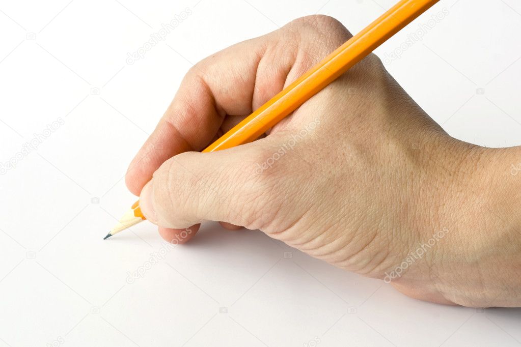 Writing hand and yellow pencil