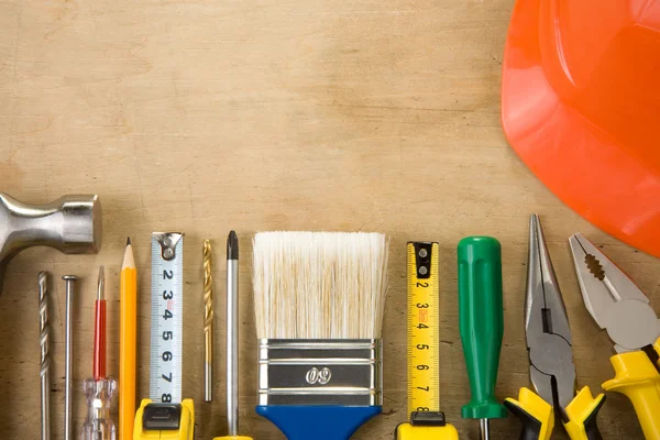 Set of construction tools on wood background — Stock Photo, Image