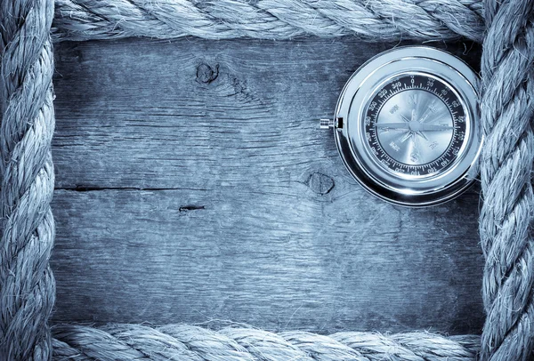 Ship ropes and compass with pen on old vintage — Stock Photo, Image