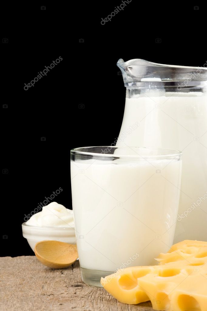 Milk products cheese isolated on black