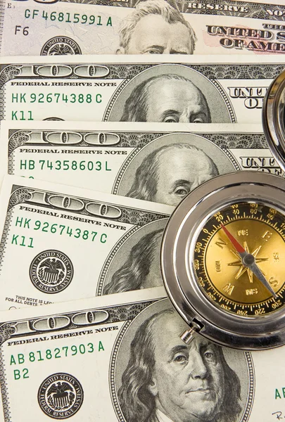 Old compass on dollars — Stock Photo, Image