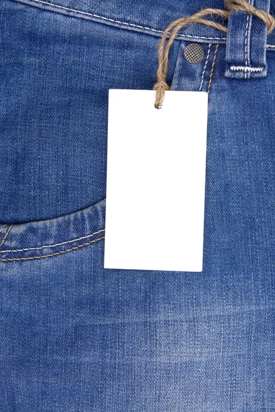 Etiqueta de precio sobre bolsillo azul jeans —  Fotos de Stock