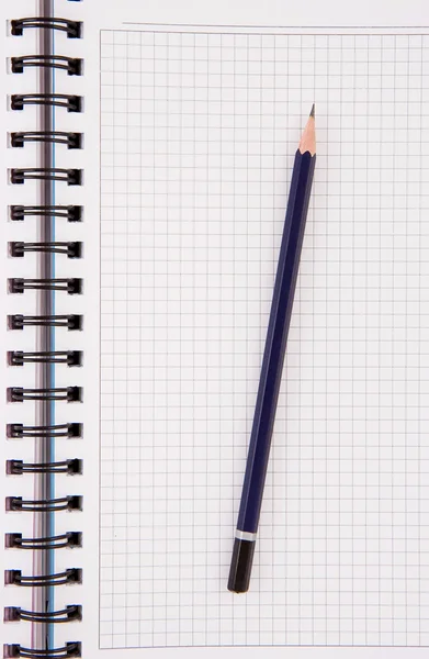 Μολύβι και ελέγχονται σημειωματάριο — Φωτογραφία Αρχείου
