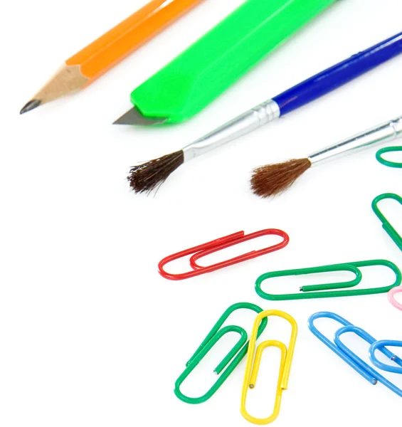 Paintbrush, paper clips and pencil on white — Stock Photo, Image