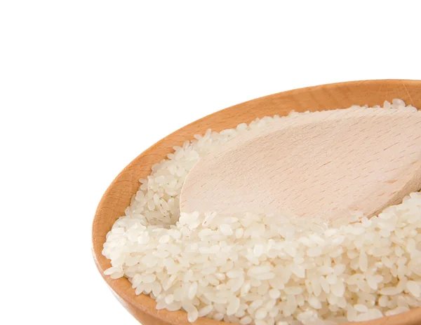 Rijst in houten plaat geïsoleerd op wit — Stockfoto