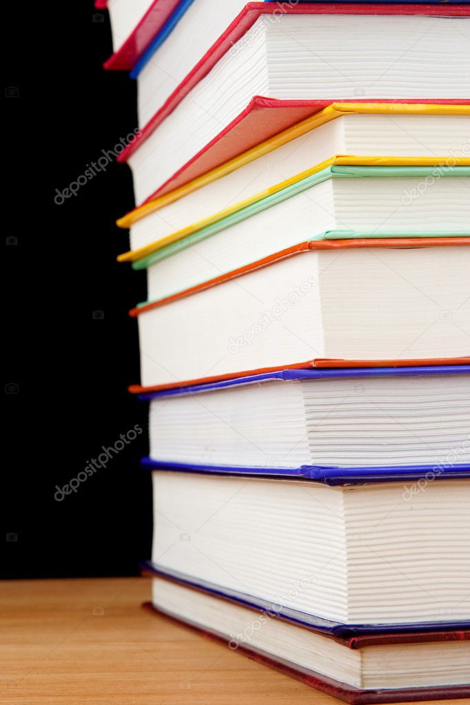 Pile of books isolated on black