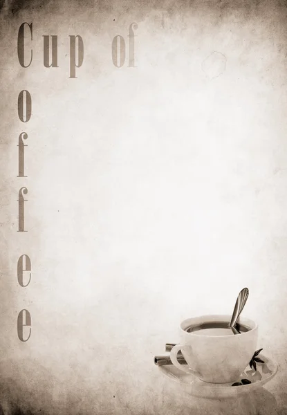 Cup of coffee on old paper parchment — Stock Photo, Image