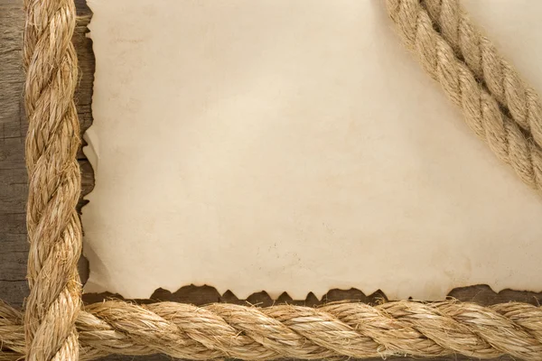 古いヴィンテージの古代の紙の背景にロープ — ストック写真