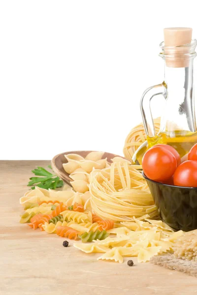 Raw pasta and food vegetable isolated at white — Stock Photo, Image