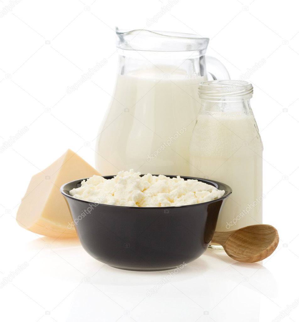 Milk products and cheese isolated on white