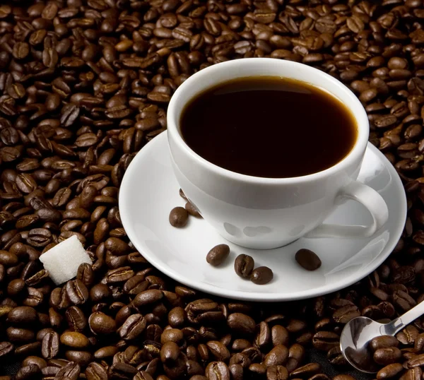 Taza de café en granos —  Fotos de Stock