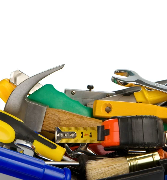 Set van tools en instrumenten in zwarte plastic doos geïsoleerd op wh — Stockfoto