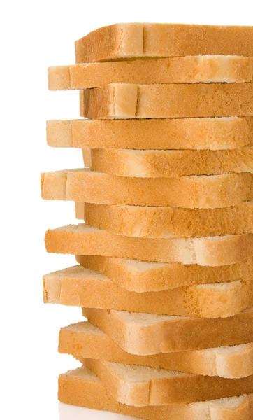 Krájený bochník chleba izolovaný na bílém — Stock fotografie