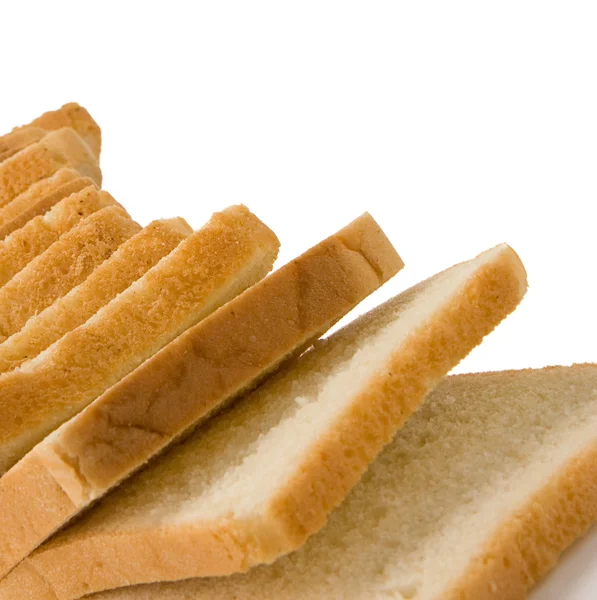 Pão fatiado isolado em branco — Fotografia de Stock