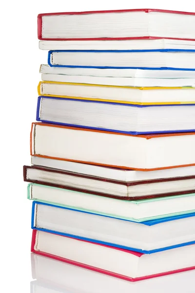 Hög med nya böcker isolerad på vit — Stockfoto