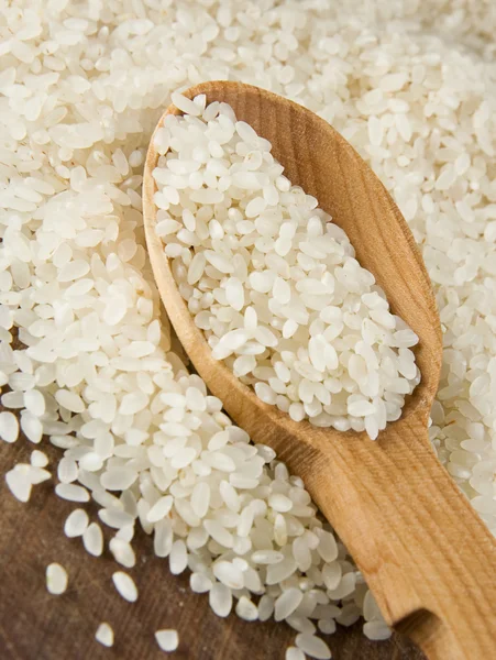 Cereali di riso in cucchiaio — Foto Stock