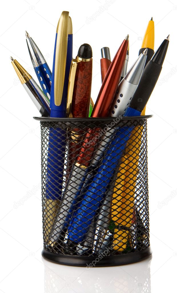 Holder basket full of pens isolated on white