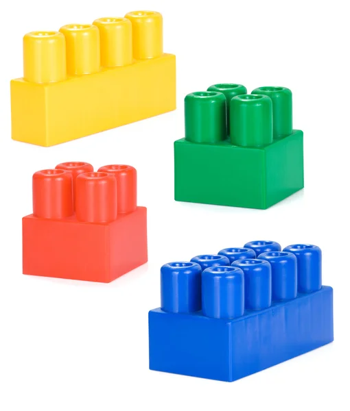 Ladrillos de plástico de colores aislados en blanco —  Fotos de Stock