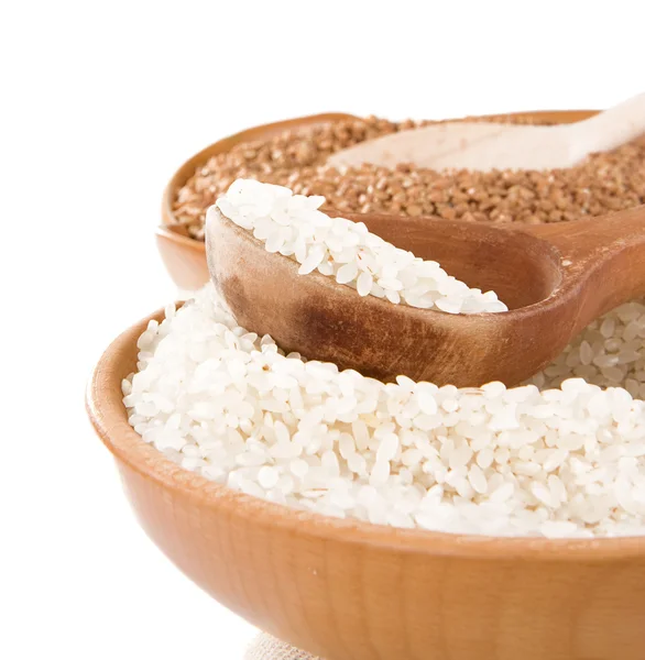 Rice and buckwheat isolated on white — Stock Photo, Image