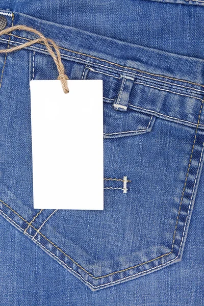 Prijskaartje over blue jeans zak — Stockfoto