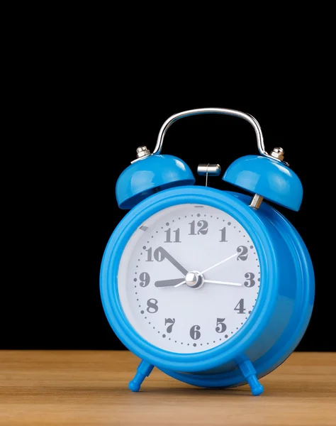 Alarm clock watch on wood — Stock Photo, Image