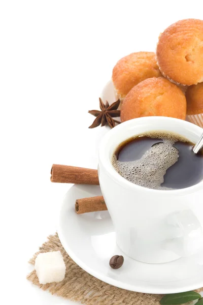 stock image Cup of coffee with beans and sweets isolated on white