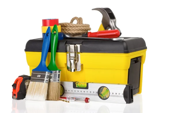 Set van tools en instrumenten in de toolbox op wit — Stockfoto