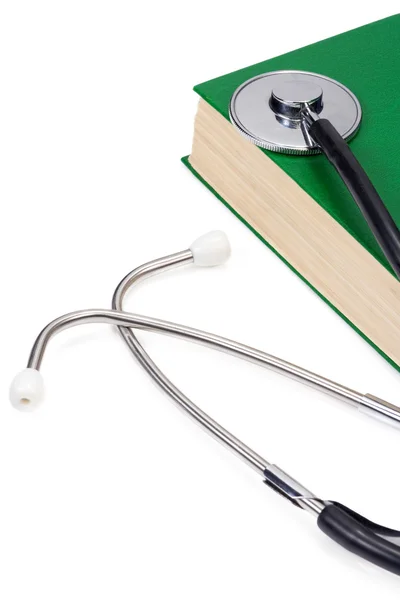 Knihy a stetoskop na bílém pozadí — Stock fotografie
