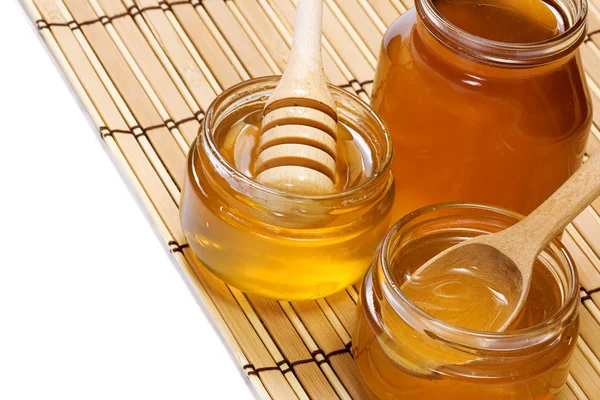 Isolated pots of honey — Stock Photo, Image
