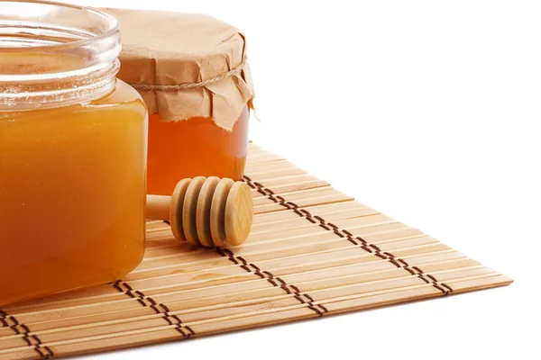 Isolated pots of honey isolated on white — Stock Photo, Image