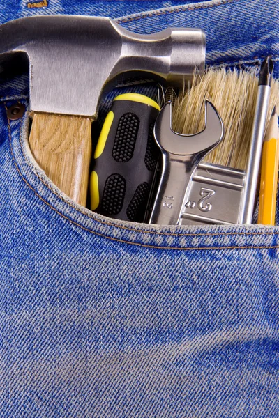 Conjunto de herramientas e instrumentos en jeans viejos — Foto de Stock