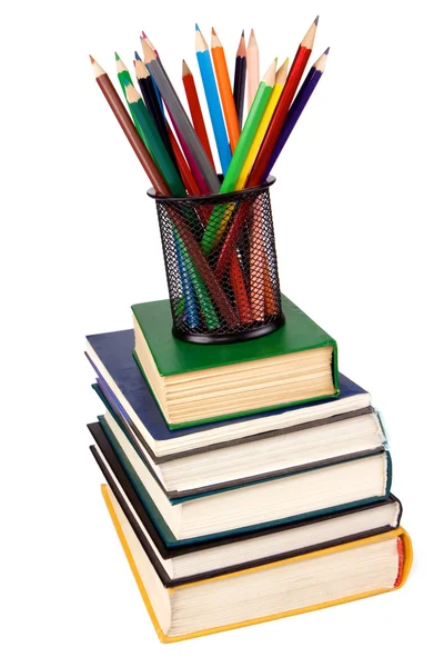 Livros e cesta com lápis isolados em branco — Fotografia de Stock