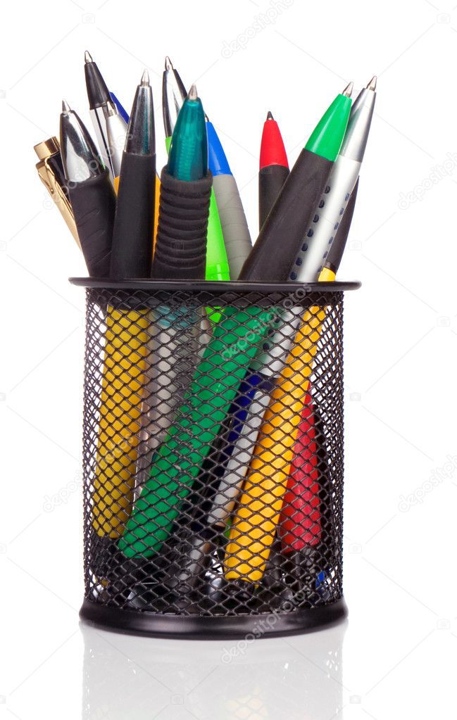 Holder basket full of colorful pens isolated on white