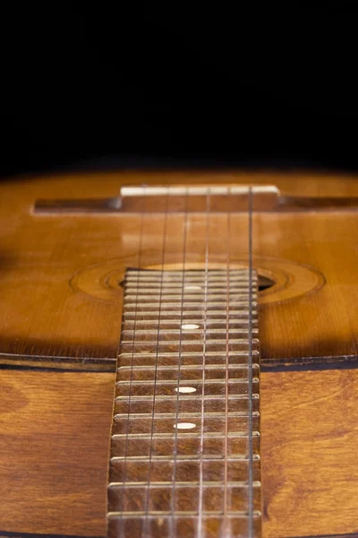 Part of guitar on black — Stock Photo, Image