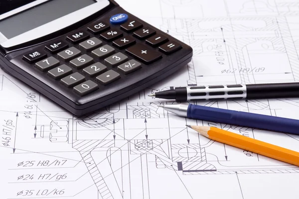 Calculator and several pens — Stock Photo, Image